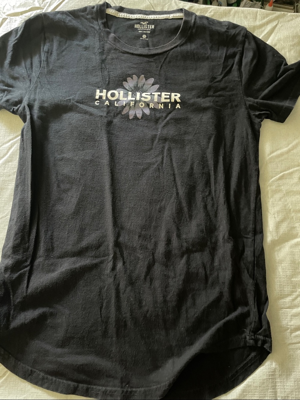 Hollister Black Tee with Lavender Daisy Logo